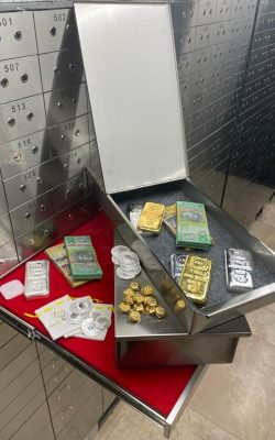 Private Vaults open showing bullion and cash